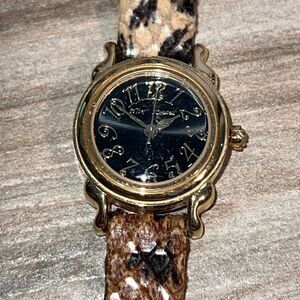 Betsey Johnson tasseled woman’s animal print watch gold tone with new battery